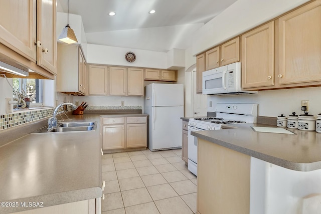 kitchen with light tile patterned flooring, light brown cabinetry, sink, decorative light fixtures, and white appliances