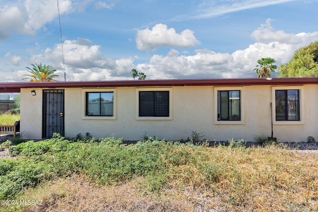 view of front of home with stucco siding
