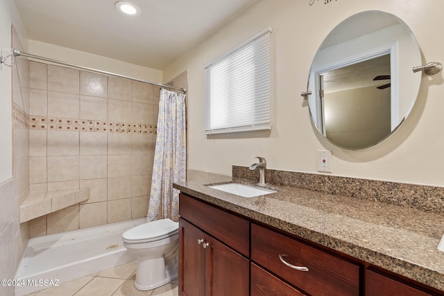 bathroom featuring tile patterned flooring, vanity, toilet, and a shower with shower curtain