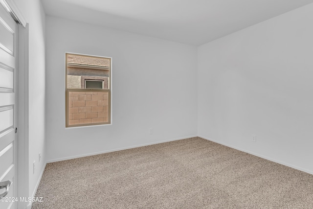 view of carpeted spare room