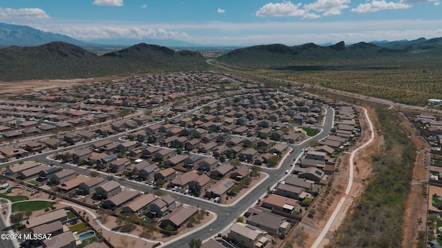 drone / aerial view featuring a mountain view