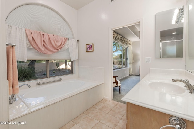 bathroom with vanity, separate shower and tub, and tile patterned floors