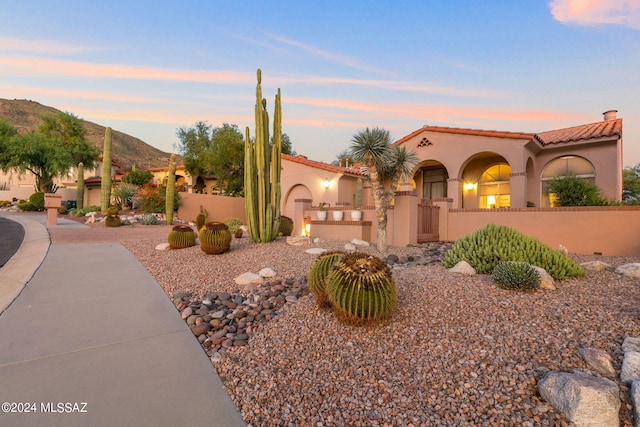 view of front of house with a mountain view