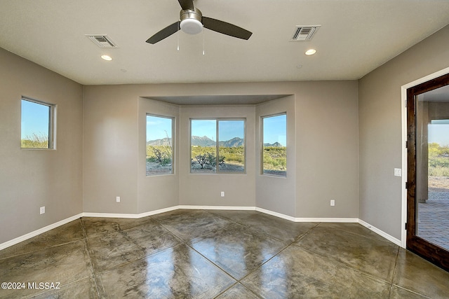 empty room featuring ceiling fan