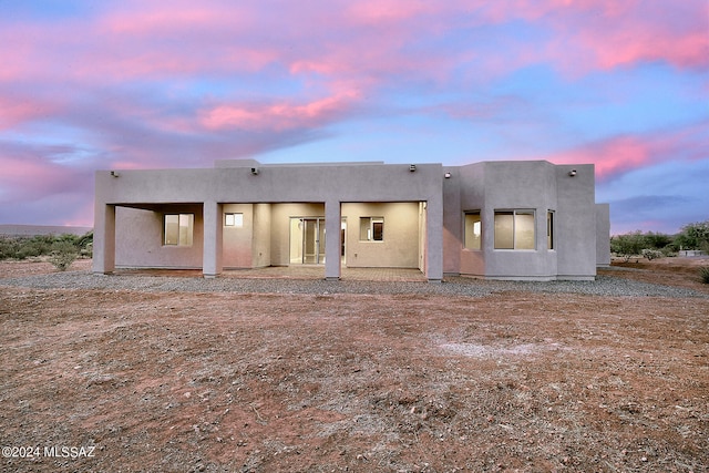 view of pueblo revival-style home