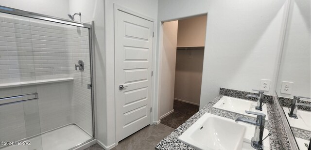 bathroom featuring vanity and walk in shower