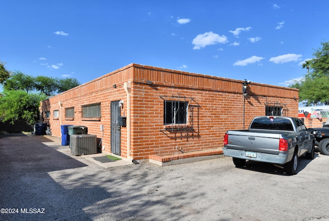 exterior space featuring central air condition unit