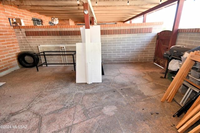 clothes washing area with light tile patterned floors and washing machine and dryer