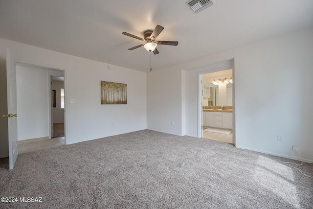 interior space with ceiling fan