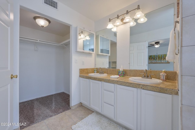 bathroom featuring tile patterned flooring, ceiling fan, and vanity