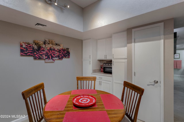 dining area featuring tile patterned floors