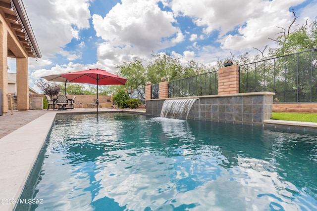 view of pool featuring pool water feature