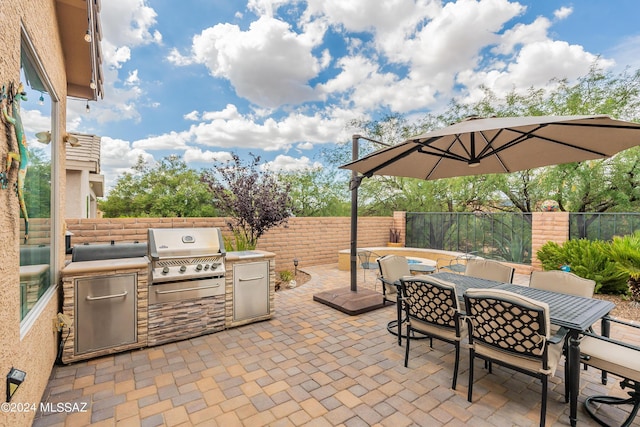 view of patio featuring area for grilling