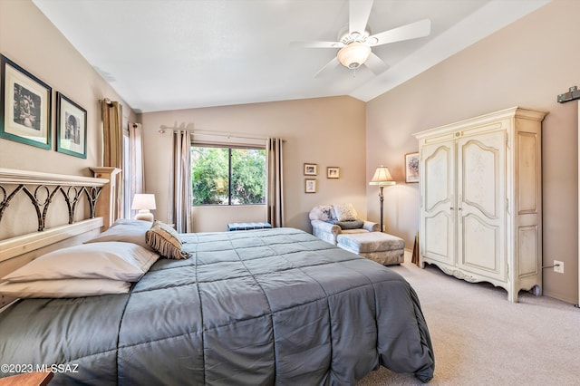 bedroom featuring lofted ceiling, ceiling fan, and light colored carpet