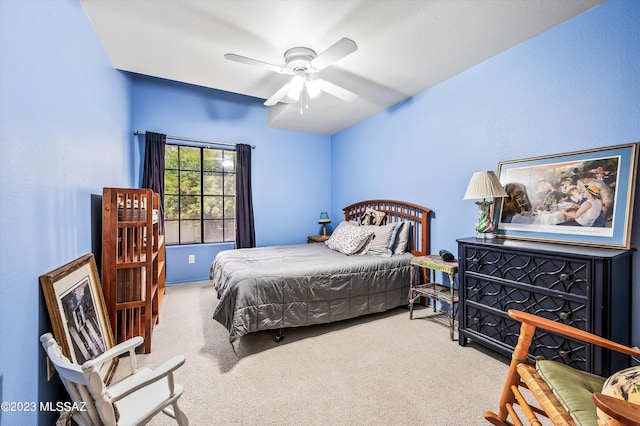 bedroom featuring ceiling fan and carpet floors