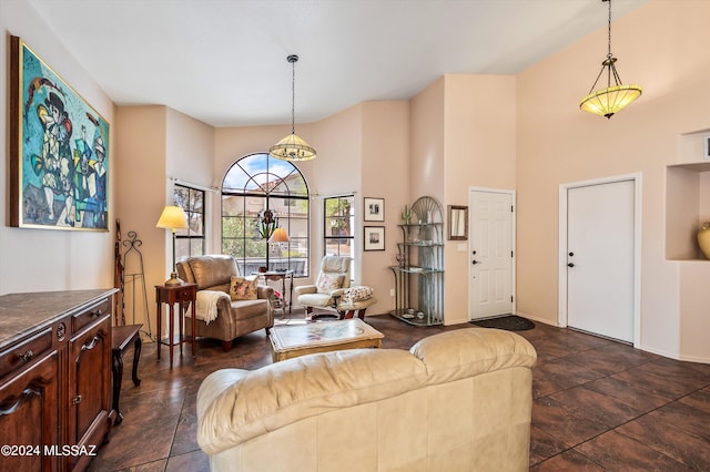 living room featuring a high ceiling