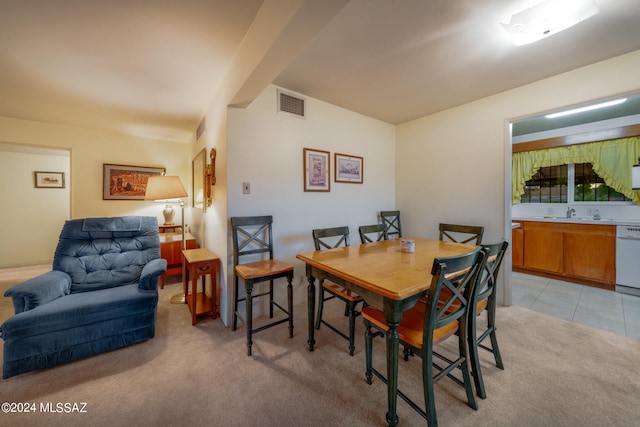 view of carpeted dining area