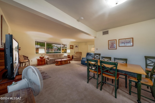 dining room featuring carpet flooring