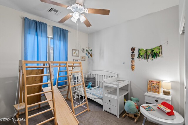 carpeted bedroom featuring ceiling fan