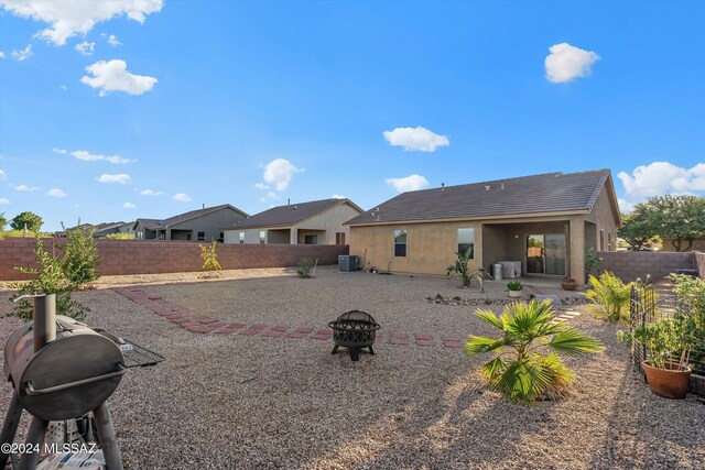 back of house featuring a patio and central AC