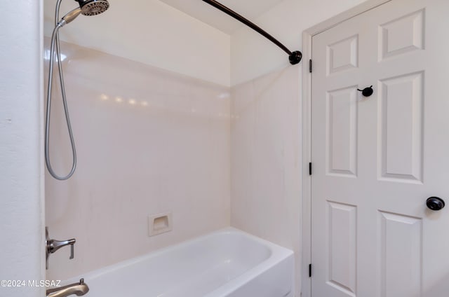 bathroom featuring  shower combination