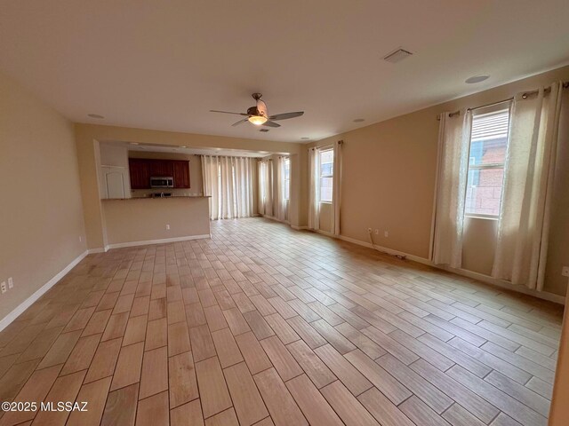 kitchen with stainless steel appliances and light stone countertops