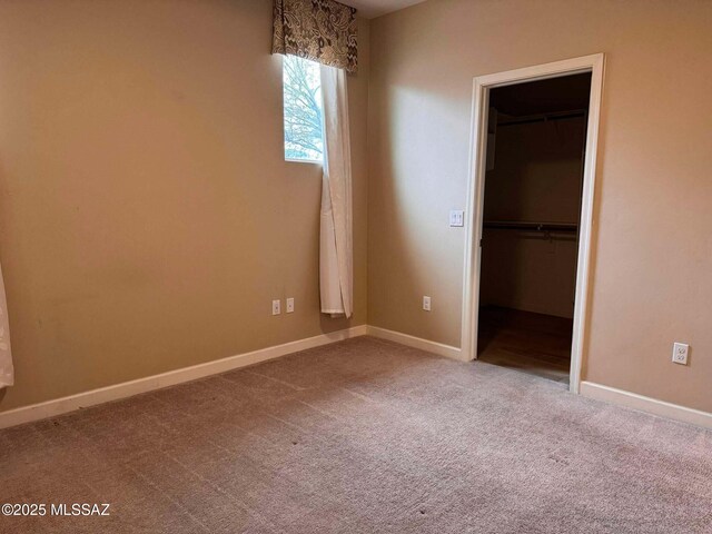 hallway with carpet