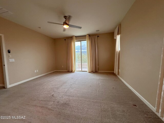 bedroom featuring light colored carpet and ceiling fan