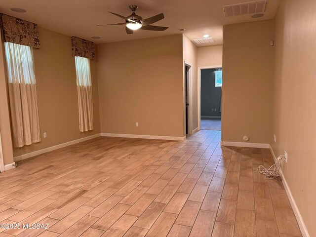 dining area with ceiling fan and light hardwood / wood-style flooring