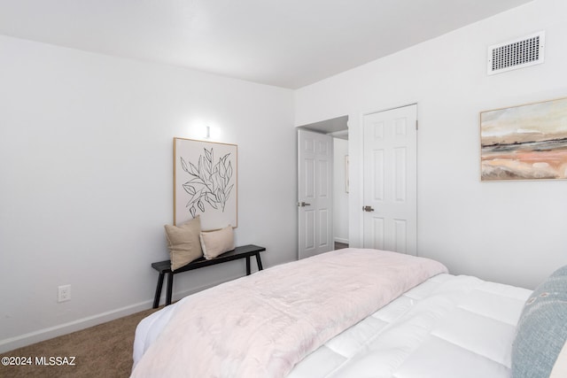 bedroom featuring carpet