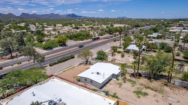 birds eye view of property featuring a mountain view