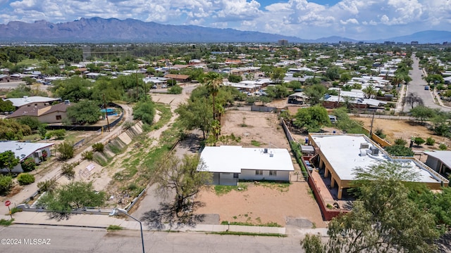 drone / aerial view featuring a mountain view