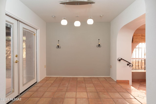 interior space featuring light tile patterned floors