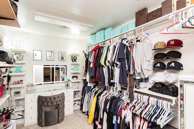 spacious closet featuring carpet and visible vents