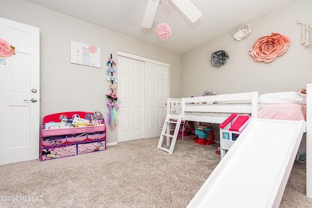 bedroom with carpet floors, a closet, and ceiling fan