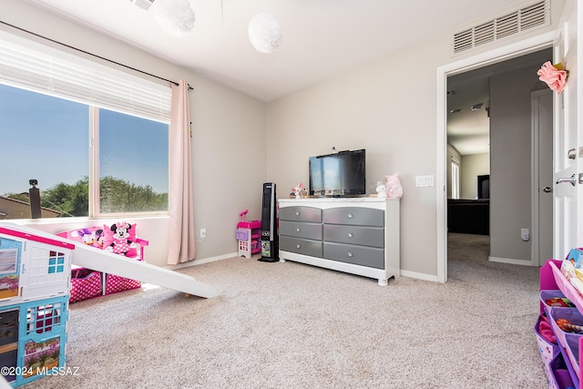 playroom with carpet floors, visible vents, and baseboards