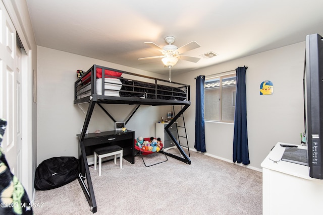 bedroom featuring ceiling fan, carpet floors, visible vents, and baseboards