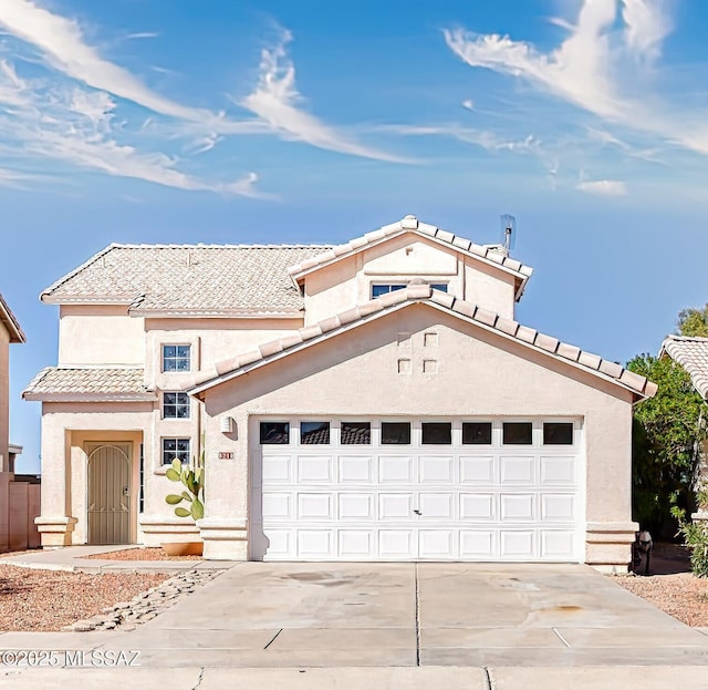 view of front of home with a garage