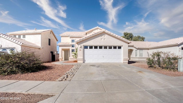 view of front of home with a garage