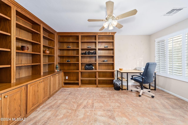 home office featuring visible vents, baseboards, and ceiling fan