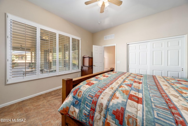 bedroom featuring visible vents, baseboards, a closet, and a ceiling fan