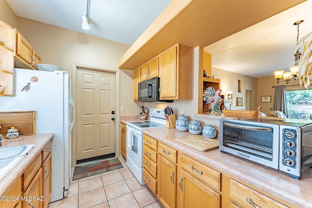 kitchen featuring an inviting chandelier, white appliances, light brown cabinetry, hanging light fixtures, and light tile patterned flooring