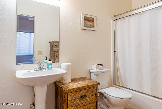 bathroom with toilet and shower / tub combo with curtain