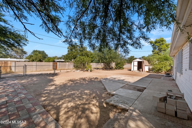 view of patio / terrace with a storage unit