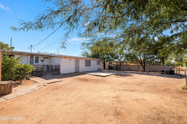 back of property featuring a patio