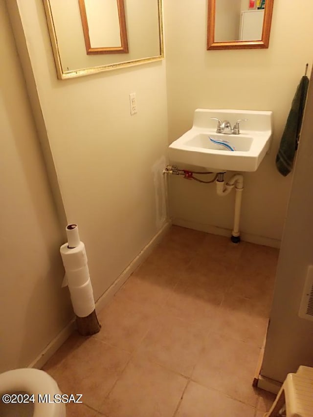 bathroom featuring sink and tile patterned floors