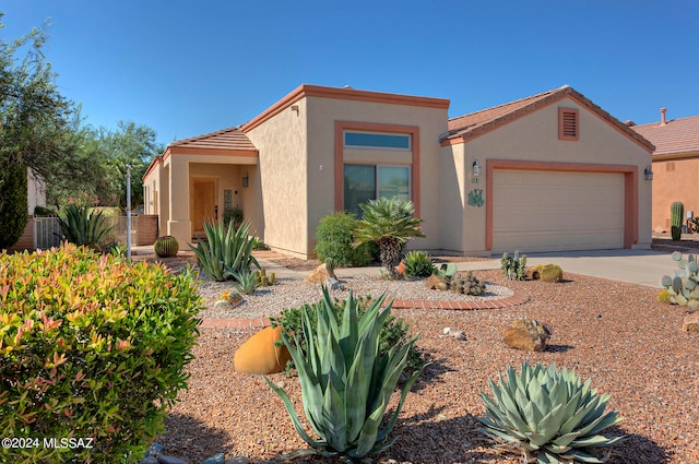 view of front of property with a garage