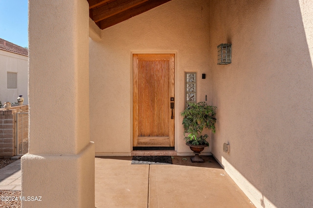 doorway to property featuring a patio area