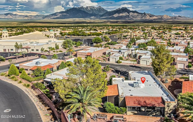 bird's eye view with a mountain view