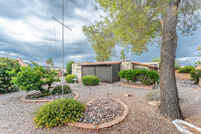 view of yard featuring a sunroom